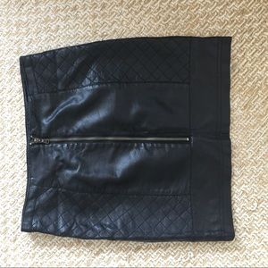 Black faux leather mini skirt with quilting